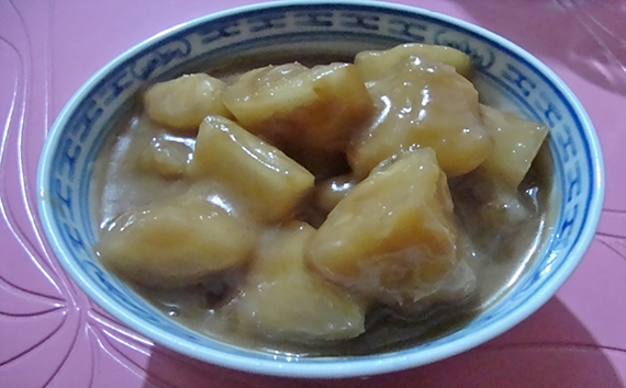 ginataang kamoteng kahoy or cassava with cream of coconut